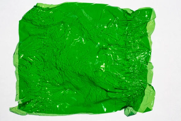 Thin Sheet Green Colour Cellophane Shiny Crumpled Surface Texture White — Stockfoto