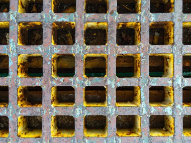 Kare paslı metal drenaj dokusu arka planı, Makro çekimini kapat, endüstriyel malzeme