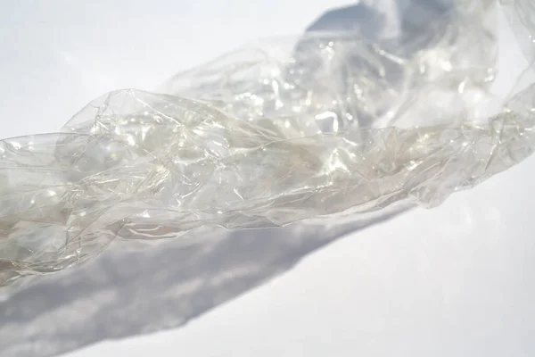 Beyaz Arkaplanda Buruşmuş Şeffaf Plastik Torba Dokusu Macro Çekimini Kapat — Stok fotoğraf