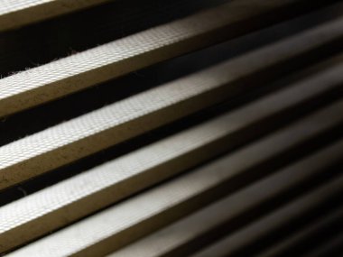Blurred dust blinds inside a window, Blurred dust and Dirty mosquito wire screen window, Light & Shadow shot, Close up and macro shot, Selective focus