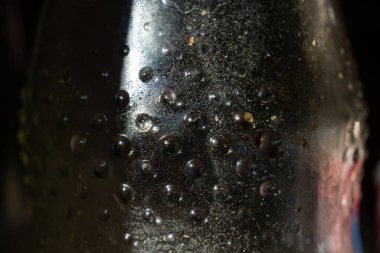 Cooking oil stained on glass bottle, Light & Shadow shot, Close up and macro shot, Selective focus