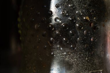 Cooking oil stained on glass bottle, Light & Shadow shot, Close up and macro shot, Selective focus