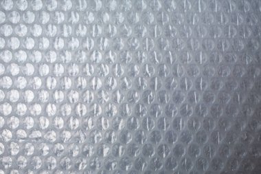 Plastik Kabarcık Yastık Kabartma Yüzey Dokuları Beyaz zemin üzerinde, Yakın çekim, Şeffaf ambalaj kavramı