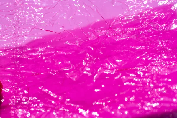 Thin Sheet Pink Colour Cellophane Shiny Crumpled Surface Texture White — Stockfoto