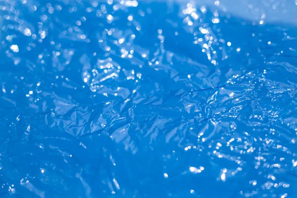 Hoja Delgada Borrosa Bokeh Celofán Color Azul Con Textura Superficial —  Fotos de Stock