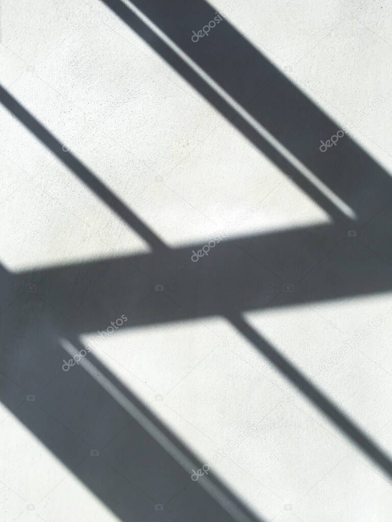 Light and Shadow lines on raw concrete or bare cement wall texture, Abstract white and grey colour background, Process building house concept