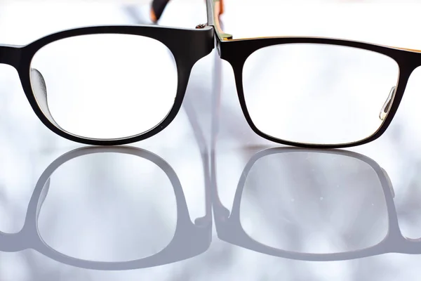Two Shortsighted Nearsighted Eyeglasses White Acrylic Table Background Close Macro — 스톡 사진
