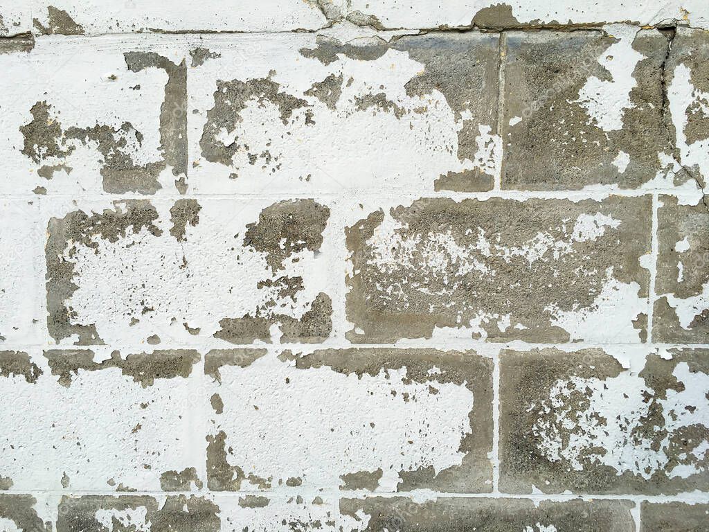 Peeled rough bricks concrete wall, Cement texture, White painted colour background, Interior and Exterior home concept