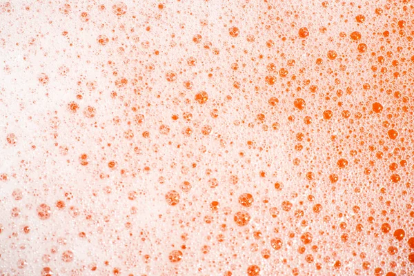 Bubble Soapsuds Transparent Skum Med Vatten Orange Bakgrund Närbild Makro — Stockfoto