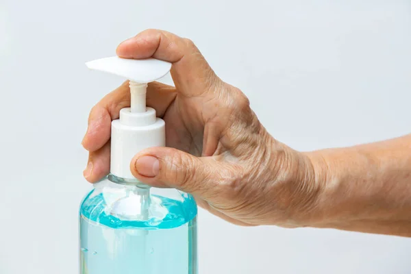 Senior Woman Hand Pressing Bottle Sanitizer Gel Pump Dispenser Wash — Stock Photo, Image