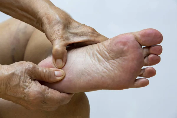Senior Woman Suffering Left Foot Pain Massaging Her Hand White — Stock Photo, Image