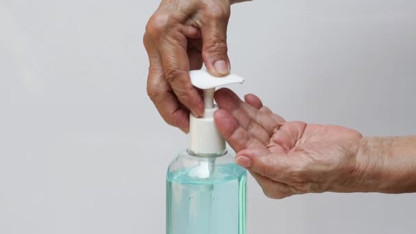 Senior Woman Hand Pressing Bottle Sanitizer Gel Pump Dispenser Wash — Stock Video