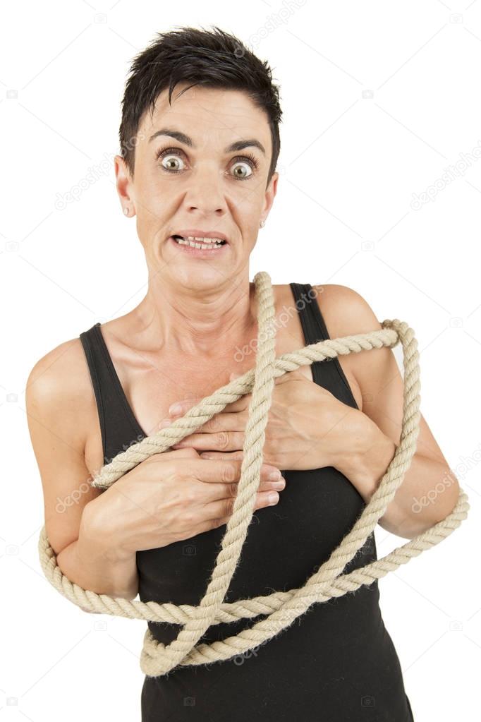 Woman tied up horrified looking