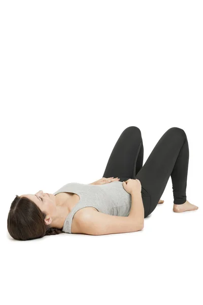 Yoga vrouw gray_anada balasana_variation — Stockfoto