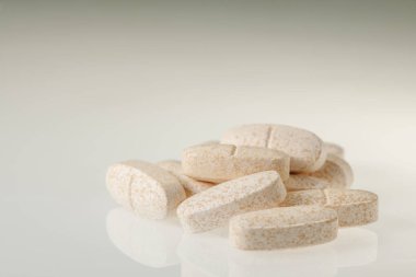 Elongated tablets on brightness level horitzontal