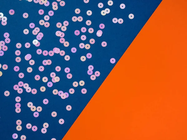 Pink dot circle confetti on blue orange background. — Stock Photo, Image