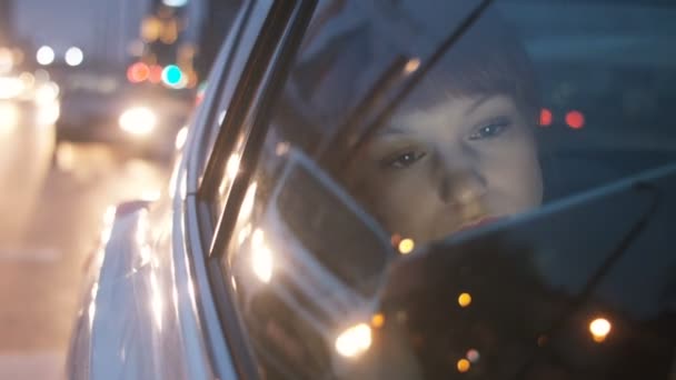 Young Businesswoman Looking Through a Window — Stock Video