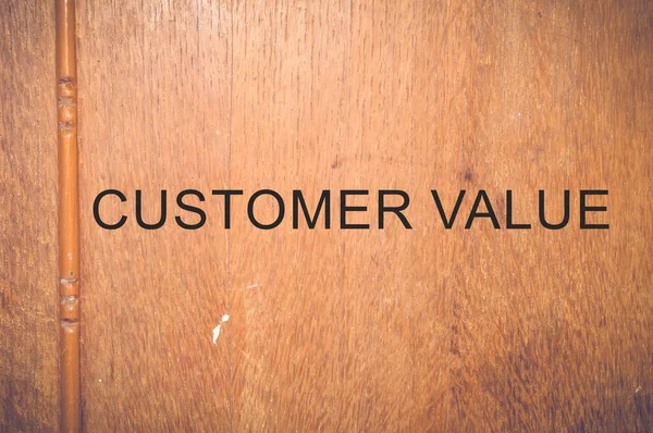 customer value written on wooden background
