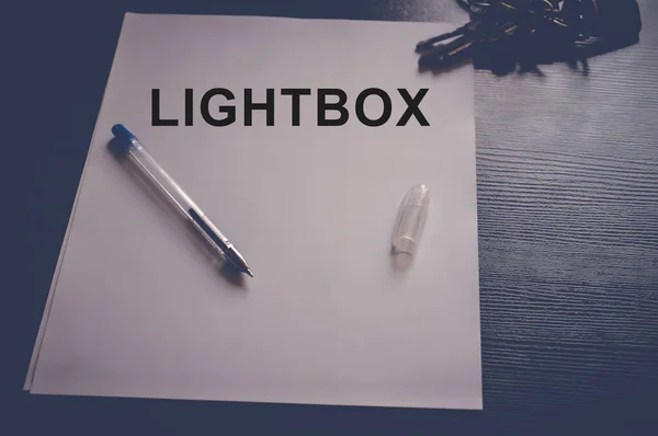 Light Box Szó Fehér Papírra Írva — Stock Fotó