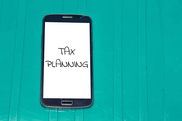 Akıllı telefondan yazılmış vergi planlama kelimesi