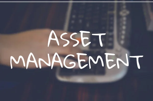 Asset management word with business blurring background