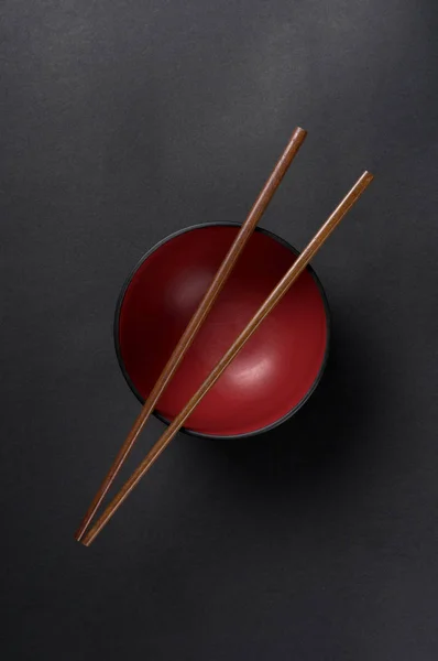 Chopsticks on Top of a Chinese Rice Bowl Dish Royalty Free Stock Photos
