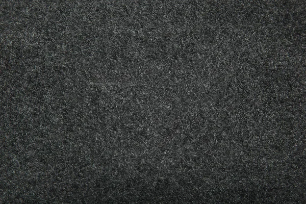 The surface of the grey car mats closeup