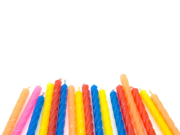 Multiple color birthday candles on the white background located — Stock Photo, Image