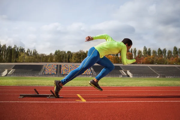 Running african man at stadium — Stock Photo, Image