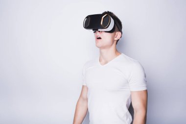 Young man trying vr goggles clipart