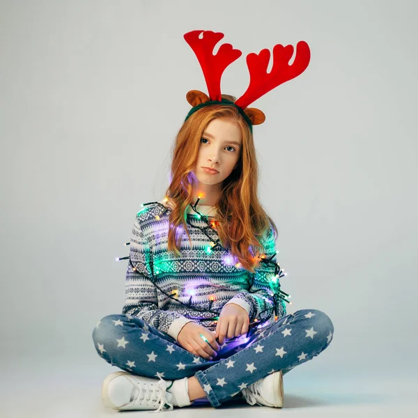 A beautiful red-haired girl with red deer horns spoiled the festivities. She is offended by her parents or friends because of relationships. Teen has problems in the family