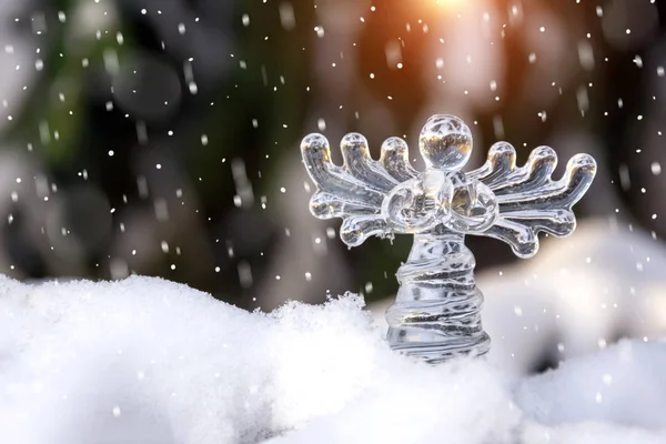 Christmas crystal angel  in snowfall