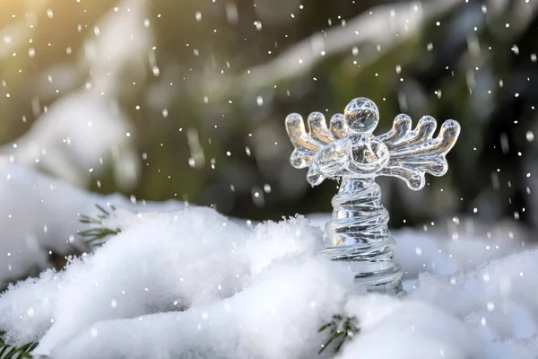 Angelo di Natale in nevicata Foto Stock