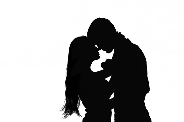 Silhouette nera di una coppia innamorata su sfondo bianco Fotografia Stock