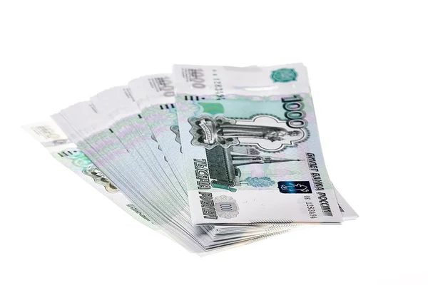 Beyaz arka plan üzerinde Rus ruble yığını.