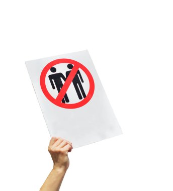 Eşcinsel evliliğe karşı protesto bir işaret tutan el.