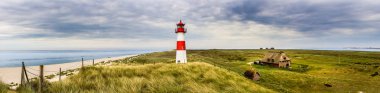 Lighthouse List Ost on the island Sylt clipart