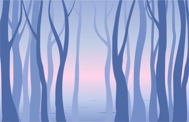 Gün batımında kış ormanı