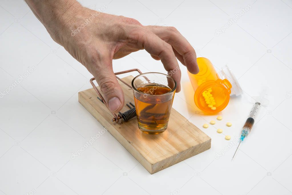  Drug Trap_fingers over shot glass