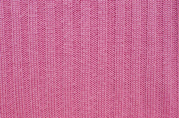 Fundo pequeno padrão de fio de tricô rosa — Fotografia de Stock