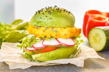 Vegan avocado lentils burger with vegetables clipart