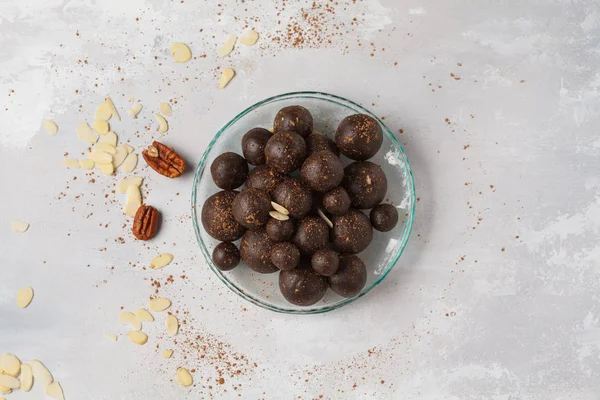 Vanilla-chocolate raw vegan sweet balls with nuts, dates and coc — Stock Photo, Image