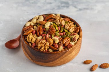 Deli ve tohum bir ahşap kase, gıda arka plan, v çeşitli