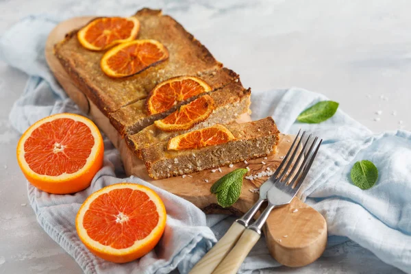 Healthy homemade orange-coconut cake, copy space. Healthy vegan
