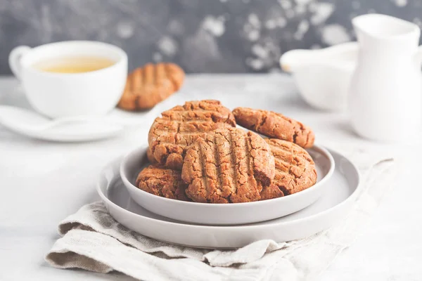 Homemade healthy aquafaba vegan cookies with tea. Vegetarian