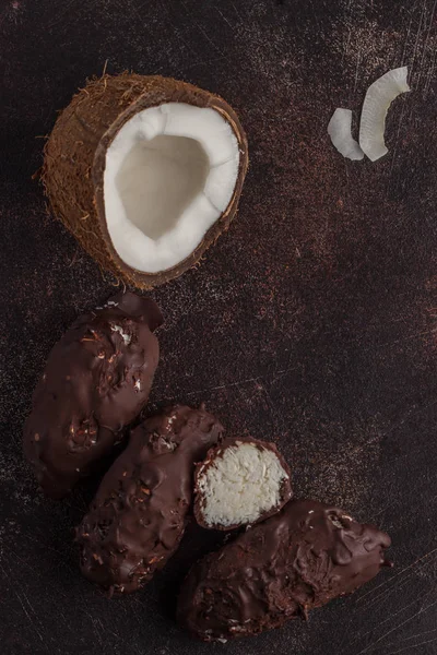 Raw homemade vegan chocolate coconut dessert bounty, top view