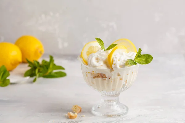 Lemon dessert. English lemon trifle, cheesecake, whipped cream,