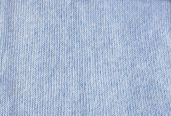 Blue knitted background, texture, pattern.