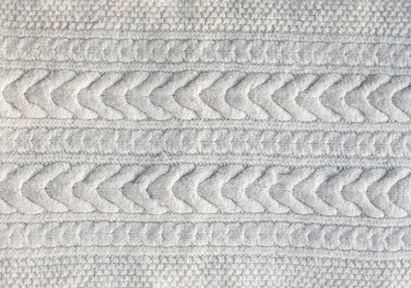 Beautiful white knitted pattern close up