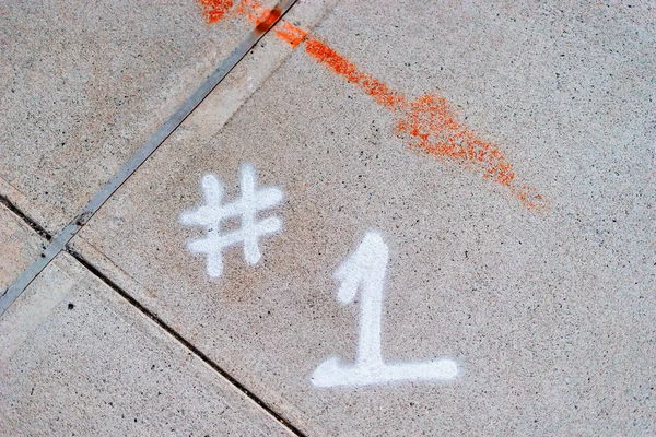 cement pavement number 1 with red arrow